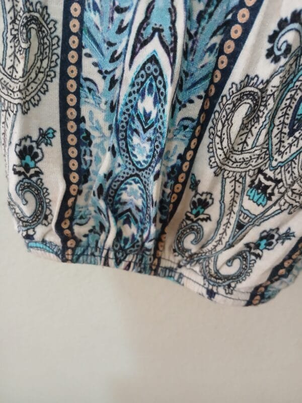 BLUSA ESTAMPADA TAM G2 - Imagem 3